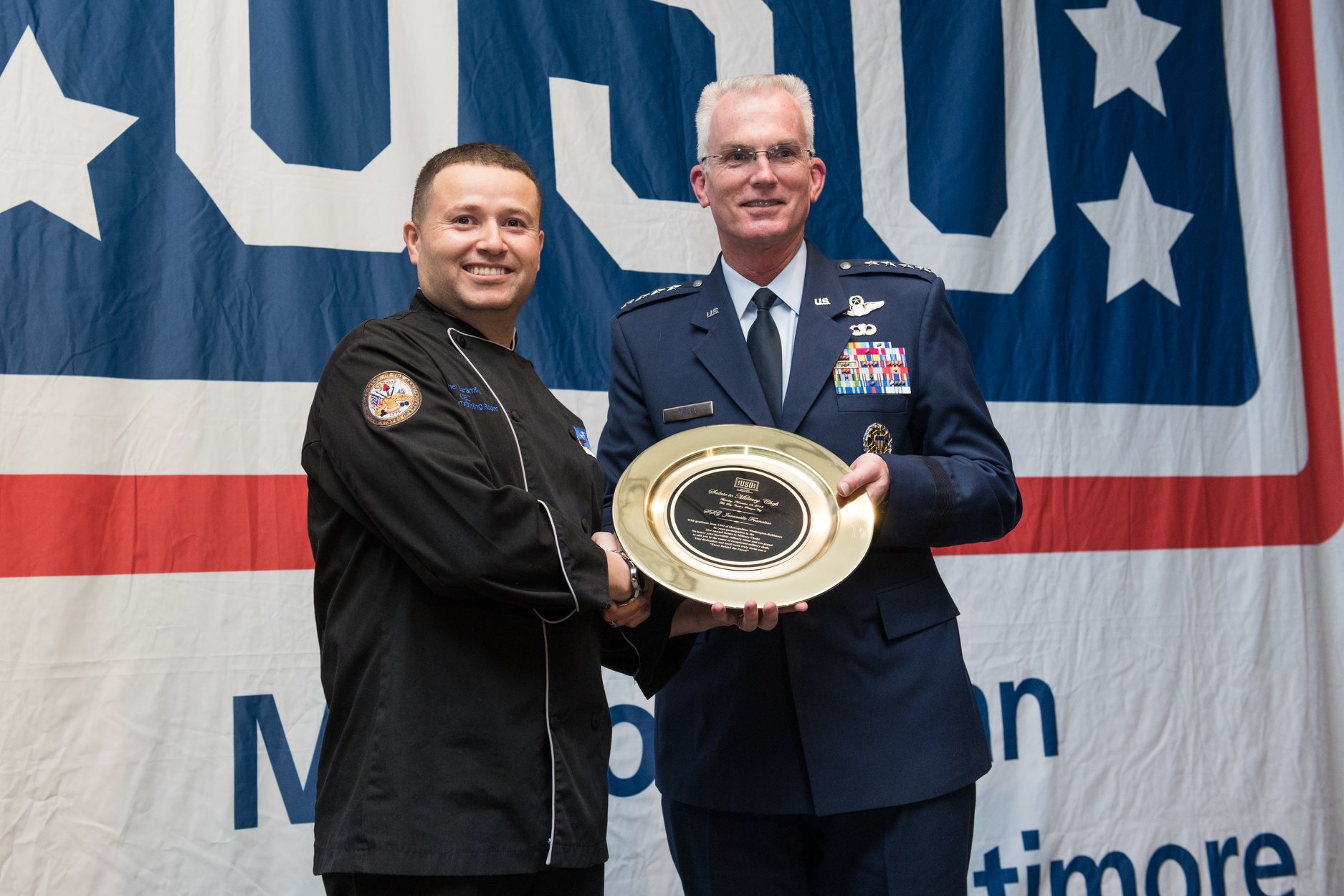 Chef J receiving USO award from Air Force general